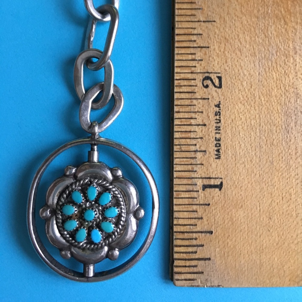 Fred and Elsie Lonconsello sterling silver pendant